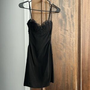 Princess Polly size 4 mini black dress with side cut outs